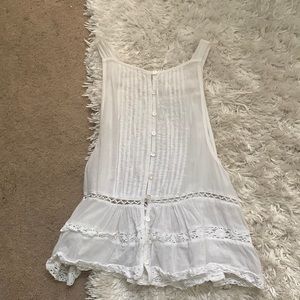Free people tank. super cute, lace, and flowy tank.
